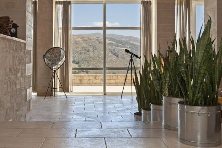  telescope next to the window