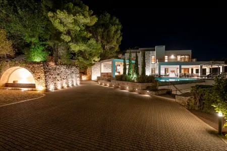 villa exterior at night