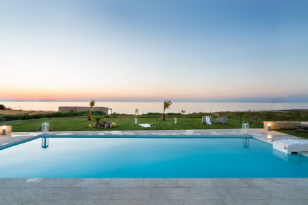 pool with sunset views