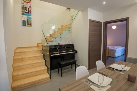  piano under the stairs