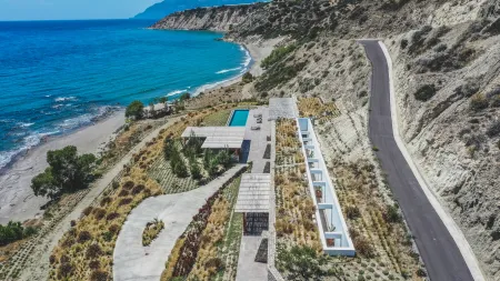  Drone photo showing villa, terraces, and ocean