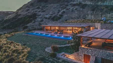 Afternoon villa view with outdoor terrace and pool