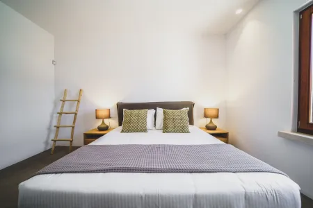  Bedroom with double bed and bedside tables