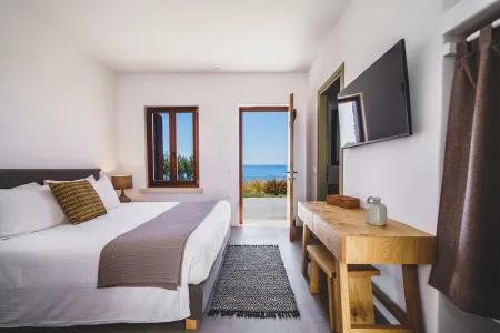  Double bed room with TV and sea view doors