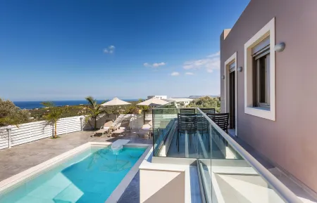 Balcony area with pool side view