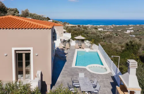  Aerial shot of the villa with pool and sea view