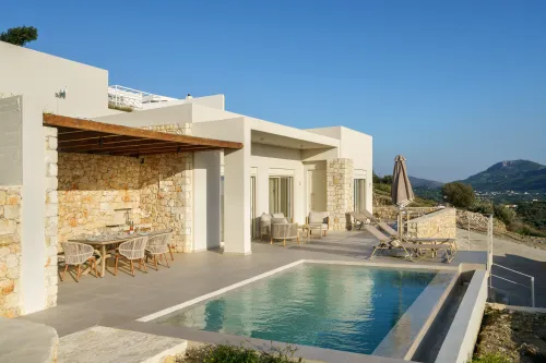 villa exterior with private pool