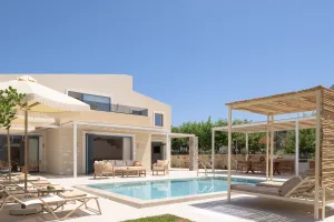 Villa Loft Moderne Pelagia Haroupi à La Kavros avec piscine chauffée et barbecue, proche de la plage et à seulement 10 minutes du lac de Kournas.