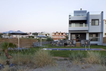 house in front of sea