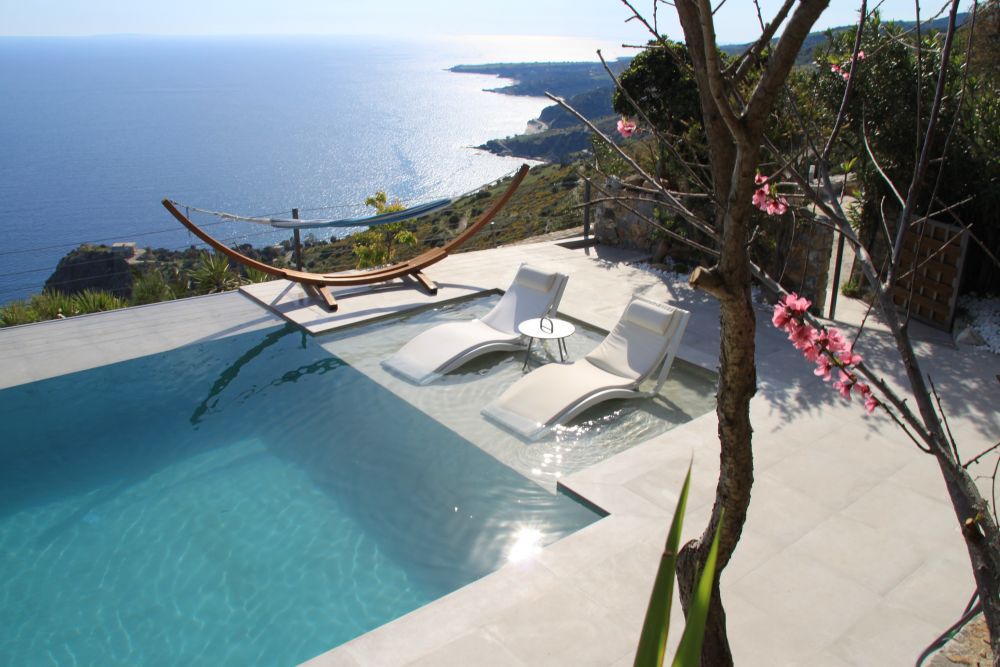 pool and sunbeds