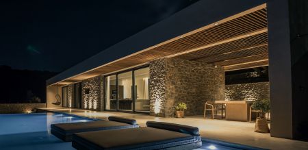  dining area & pool at night