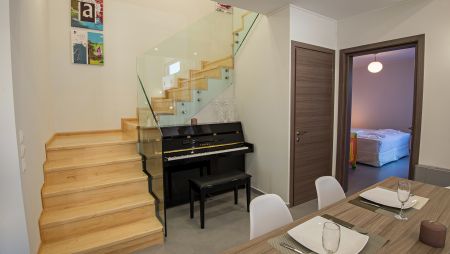 piano under the stairs